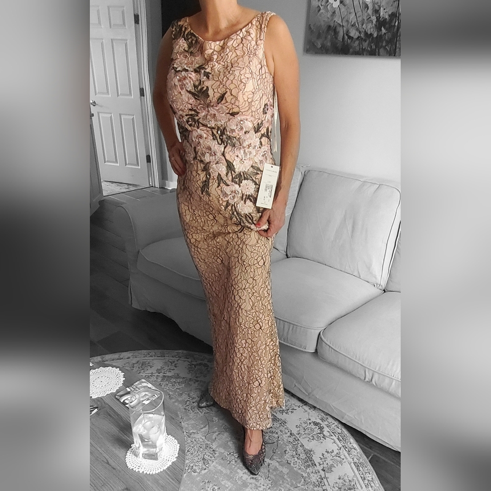 Formal beaded sheath gown.
